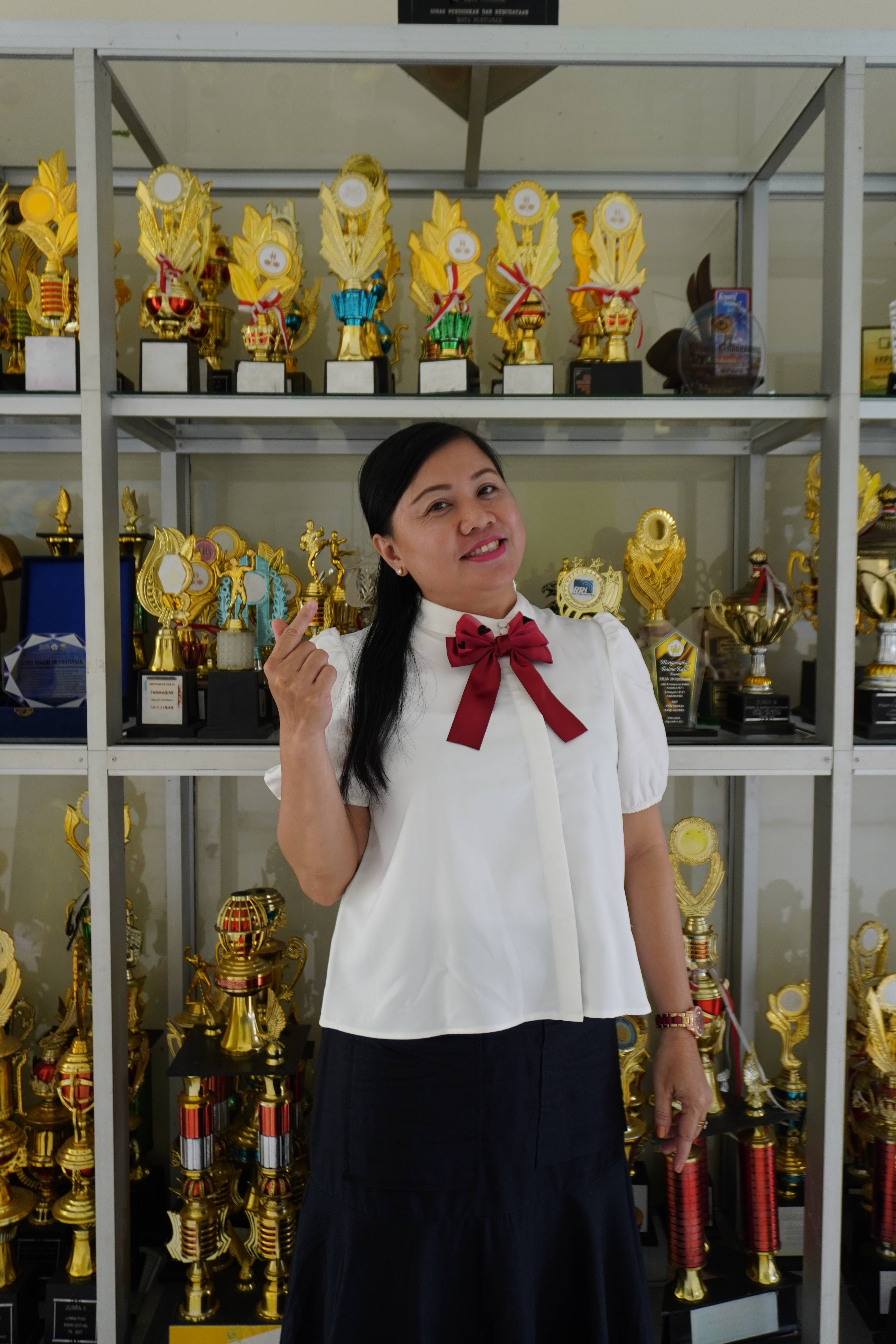 Rosalia Neti, S.Pd